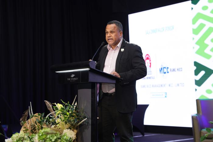 Speaker at the summit podium