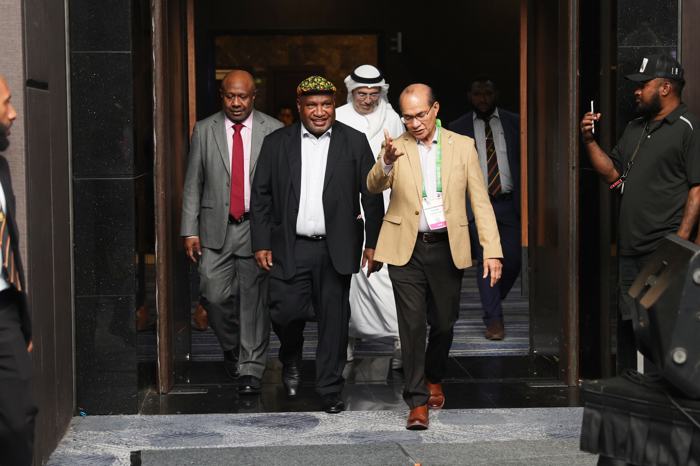 Dignitaries arriving at a summit venue
