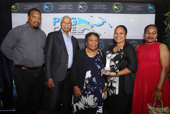 Award presentation group photo at PNG CORE