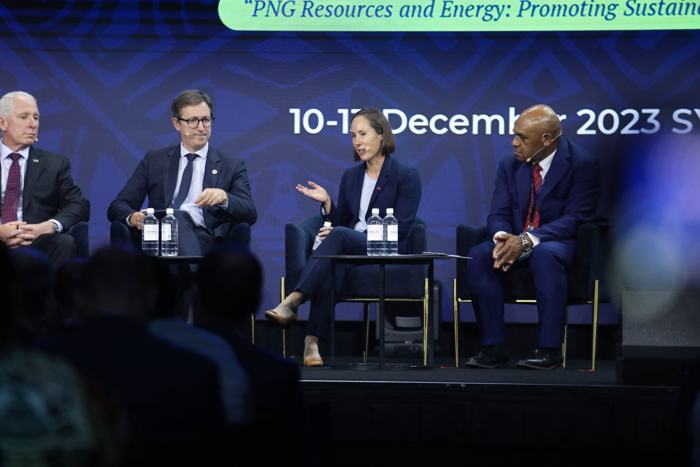 Panel discussion on stage at a resources and energy conference