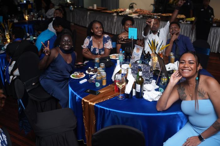 Guests seated at gala dinner tables