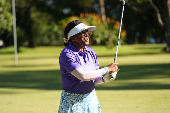 Golfer following through on a drive