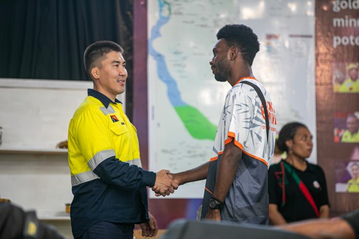 Handshake at a mining company event