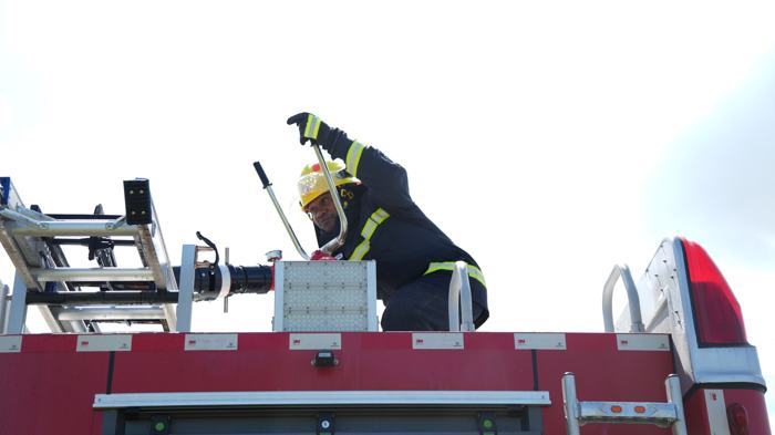 Firefighter on an aerial ladder