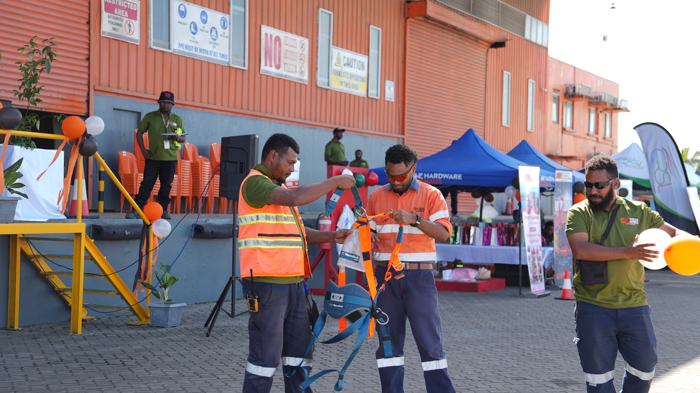Workers at safety activity stations