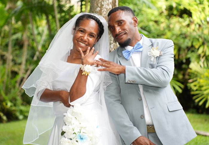 Bride and groom laughing together