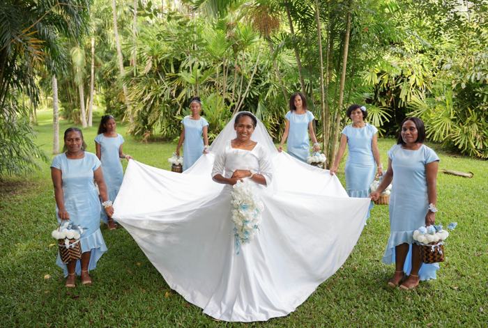 Bride with bridesmaids in blue