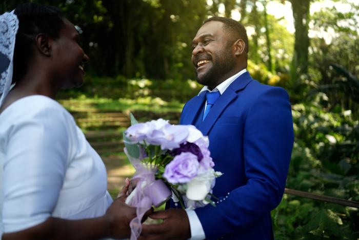 Couple sharing a smile in a garden