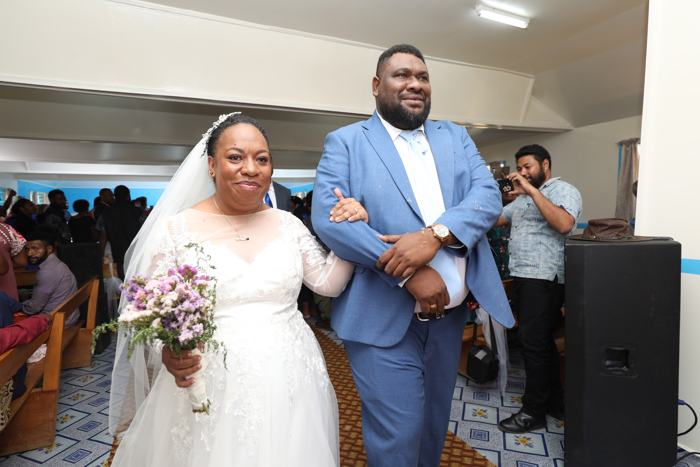 Couple walking down the aisle
